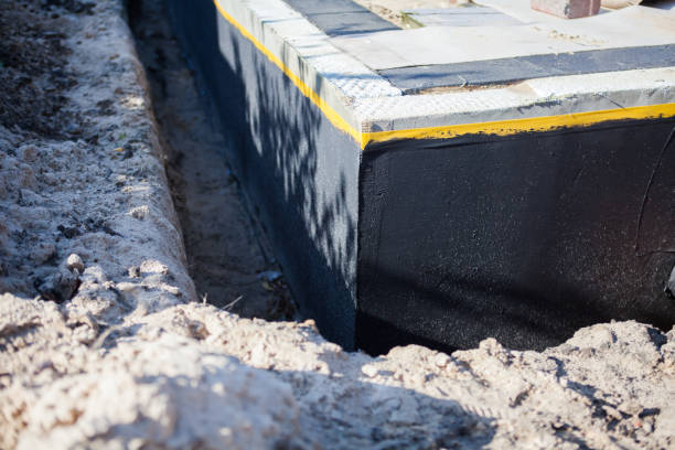 Professional Emergency Waterproofing technician working in Edwardsburg, MI